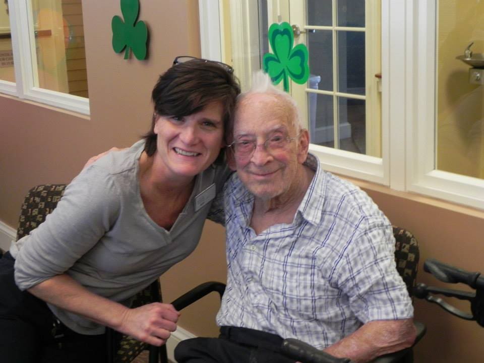 Life Enrichment Assistant Abbi with residents