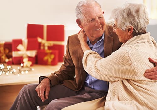 Portrait of an affection senior couple at Christmas